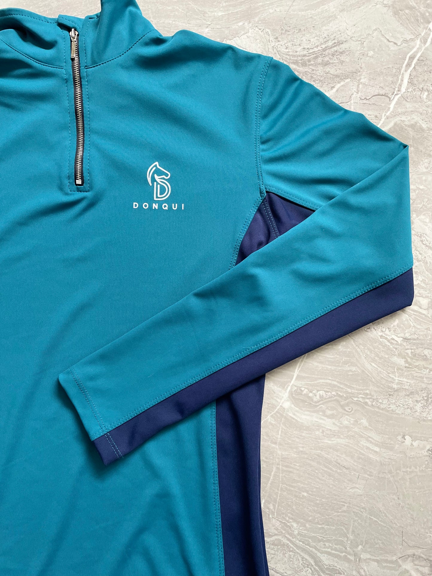 donqui baselayer paardrijden