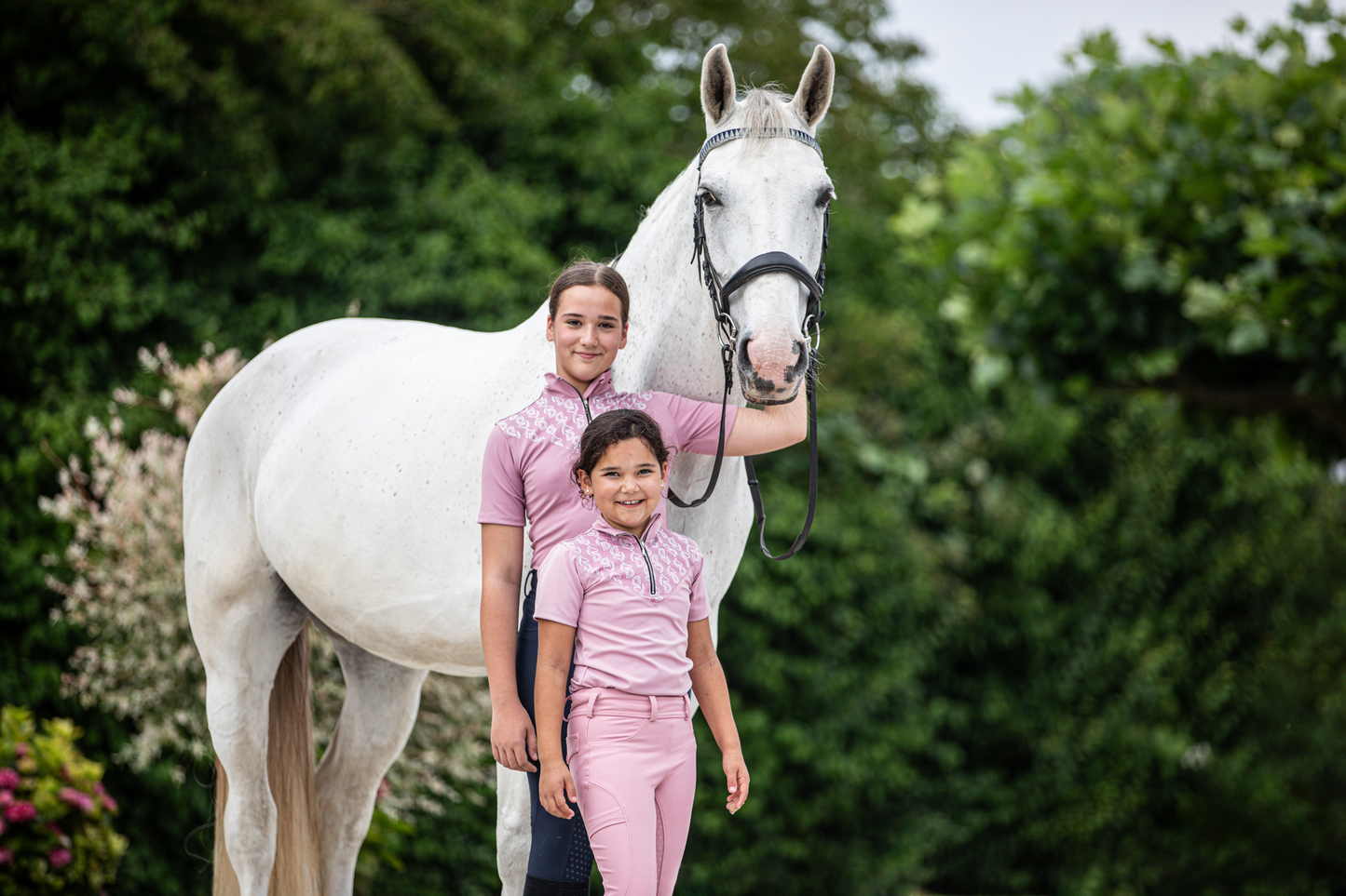 roze rijbroek paardrijbroek rijlegging